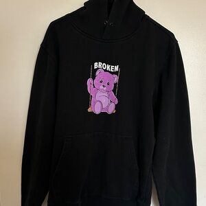 Black Hoodie with Purple Bear Design